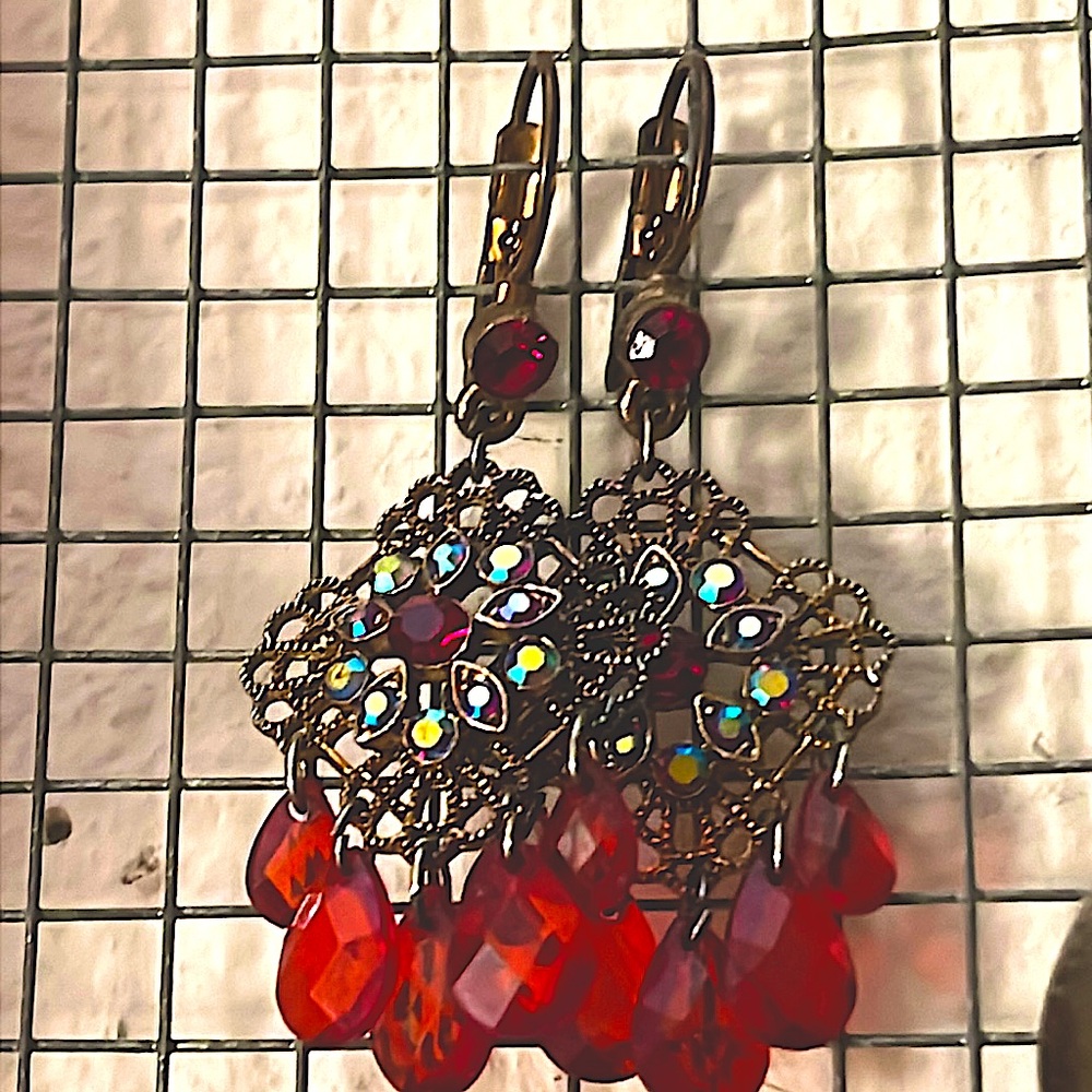 Red beaded formal cocktail earrings with iridescent and red crystal detail
